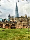 The London Shard towering over the Tower of London Royalty Free Stock Photo