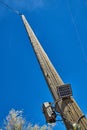 Looking up telephone pole with camera and solar panel Royalty Free Stock Photo