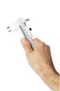 Image of a male hand holding a caliper