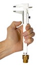 Image of a male hand holding a caliper