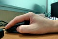Image of male hands pushing keys of a computer mouse Royalty Free Stock Photo