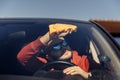 Image of male with orange rag washing windshield Royalty Free Stock Photo