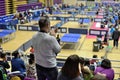 Man applauding athletes in table tennis competitions