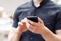 Image of a man`s hands using a smart phone, close up Royalty Free Stock Photo