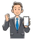 A man in a suit holding a smartphone and making a guts pose