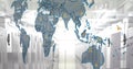 Image of map and computer language over data server room Royalty Free Stock Photo