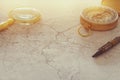 Image of map, magnifying glass and old compass. selective focus Royalty Free Stock Photo