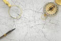 Image of map, magnifying glass and old compass. selective focus Royalty Free Stock Photo