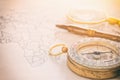 Image of map, magnifying glass and old compass Royalty Free Stock Photo