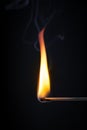 match flame dark background Royalty Free Stock Photo