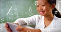 Image of mathematical symbols over asian girl using smartphone Royalty Free Stock Photo