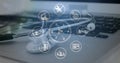 Image of media icons over laptop and stethoscope Royalty Free Stock Photo
