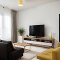 modern interior of a living room in an apartment with yellow armchairs and a TV area direct angle to the TV stand and TV