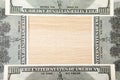 Image of money wooden desk