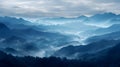 Mountain range with clouds and fog covering the peaks Royalty Free Stock Photo