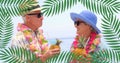 Image of moving leaves over caucasian senior couple on the beach Royalty Free Stock Photo