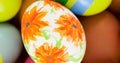 Image of multiple colourful easter eggs lying