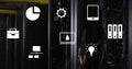 Image of multiple digital icons floating against close up of a computer server