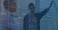 Image multiple graphs with changing numbers, diverse female explaining strategy to coworker