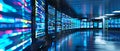 An image of multiple monitors showing a programming language program with a system monitoring interface. A data center
