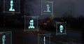 Image of multiple profile icons with data processing over city traffic at night Royalty Free Stock Photo