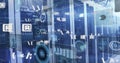 Image of multiple symbols, radars, globes and computer language over server racks