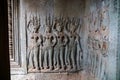 Image of naked women, concubines, on the wall of Angkor Wat