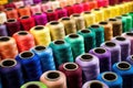 image of neatly organized thread spools by color