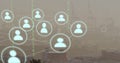 Image of network of connections with icons and binary coding over cityscape Royalty Free Stock Photo