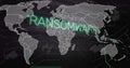 Image of network of connections over world map and ransomware text Royalty Free Stock Photo
