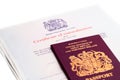 Image of the new issued pre brexit style British passport with naturalization certificate