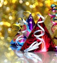 Image of New years eve celebration with hats on a shiny table top Royalty Free Stock Photo