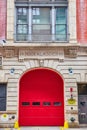 New York City outside fire station 25 Hook and Ladder with huge red door straight on