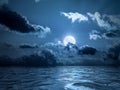 Full moon over the ocean Royalty Free Stock Photo