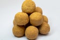 Nice Crushed Peanut Chikki Ball in White Background Stock Photo