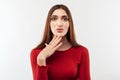 Image of nice serious woman thinking and looking at camera. Human emotions, facial expression concept Royalty Free Stock Photo