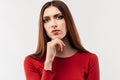 Image of nice serious woman thinking and looking at camera. Human emotions, facial expression concept Royalty Free Stock Photo