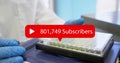Image of numbers, subscribers text in notification bars, close up of researcher and equipment Royalty Free Stock Photo