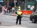 Image of an NYPD police officer directing traffic. Royalty Free Stock Photo