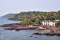 Image of the ocean with vast greenery just beside it, in Dona paula