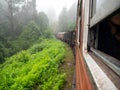 Image of old english train riding in mountains of Sri Lanka Royalty Free Stock Photo
