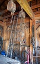 Old farm tools hanging inside an old barn