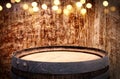 Image of old oak wine barrel in front of wooden background Royalty Free Stock Photo