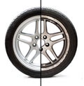 Image of old refurbished tyre showing before and after conditions concept of restoration or improvement Royalty Free Stock Photo