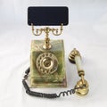 Image of an old telephone from before the 1960s on white background Royalty Free Stock Photo
