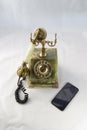 Image of an old telephone from before the 1960s on white background