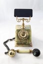 Image of an old telephone from before the 1960s on white background Royalty Free Stock Photo