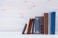 Image of old vintage books on a wooden shelf Royalty Free Stock Photo