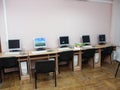 Image of an old, vintage computer in a derelict abandoned police station covered in debris