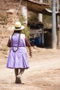 Image of a old woman walking in a Andean town in Urubamba Peru Royalty Free Stock Photo